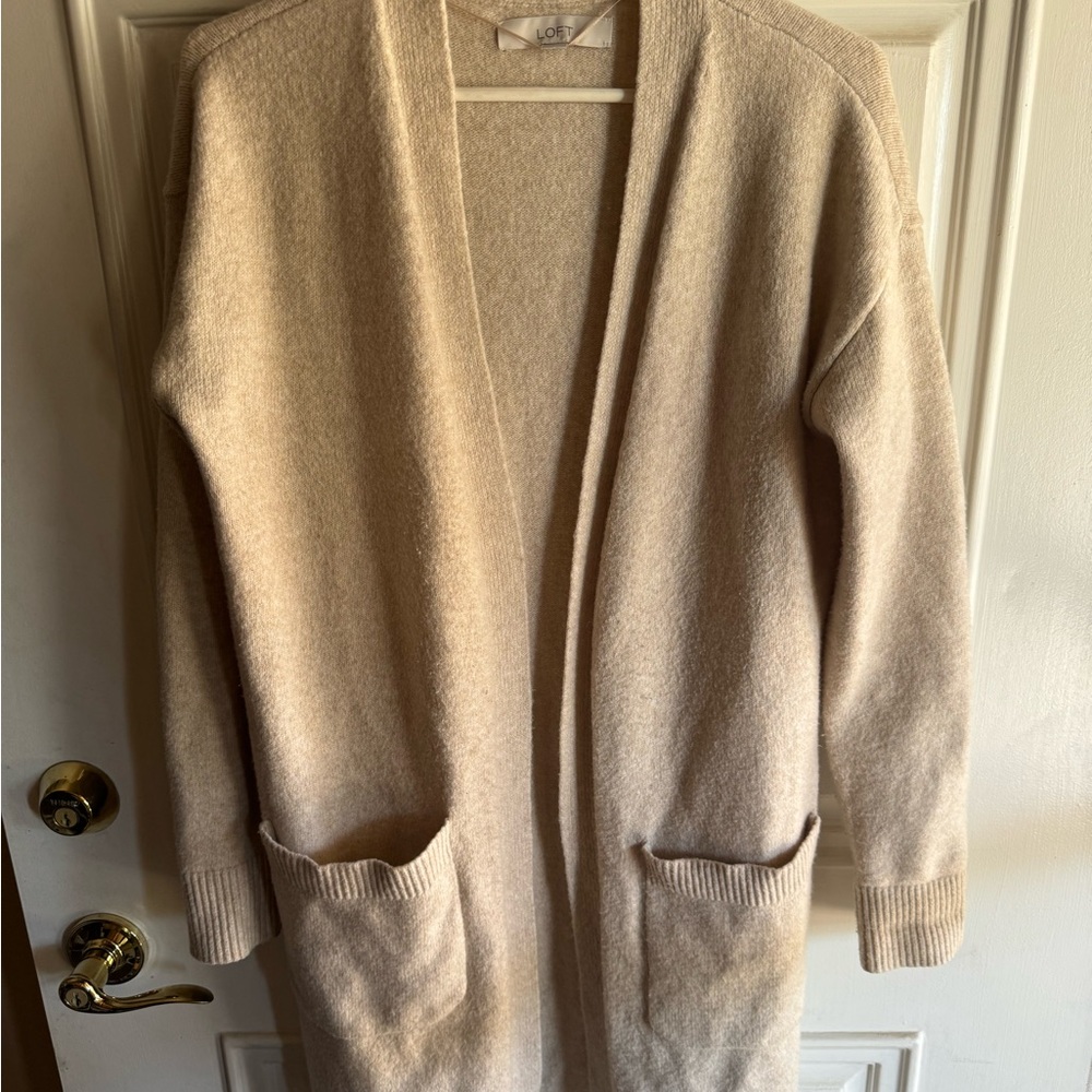 Long beige cardigan duster style